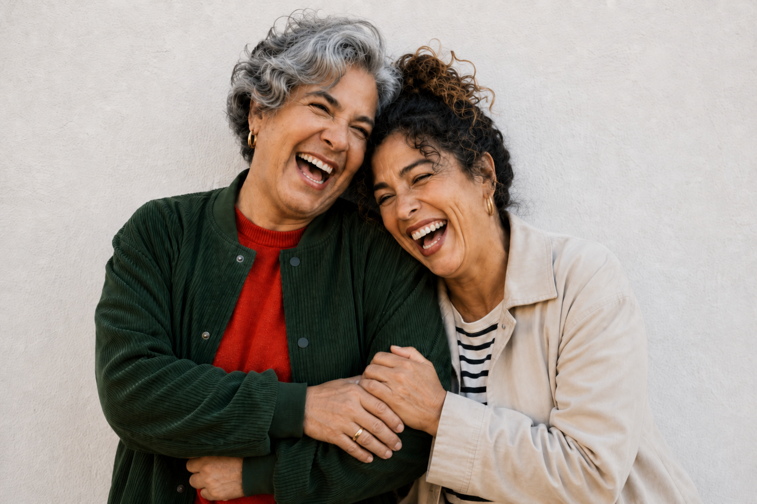 Two women laughing together